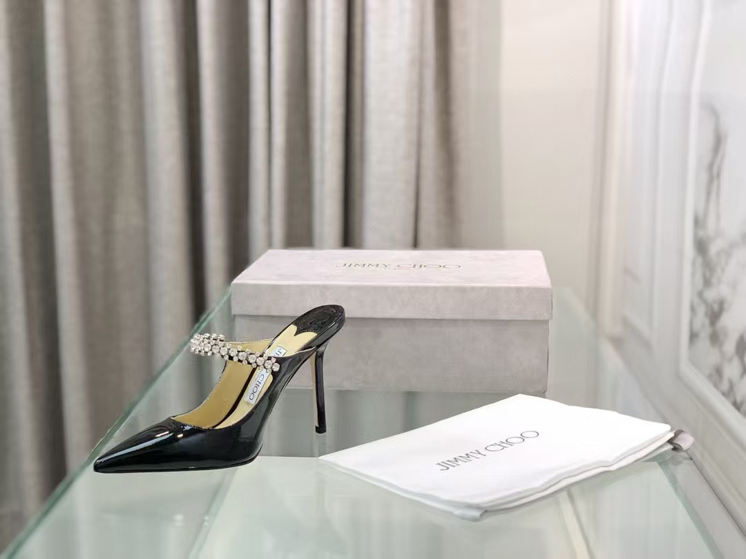 ua Ji*y Ch* mules en cuir bing