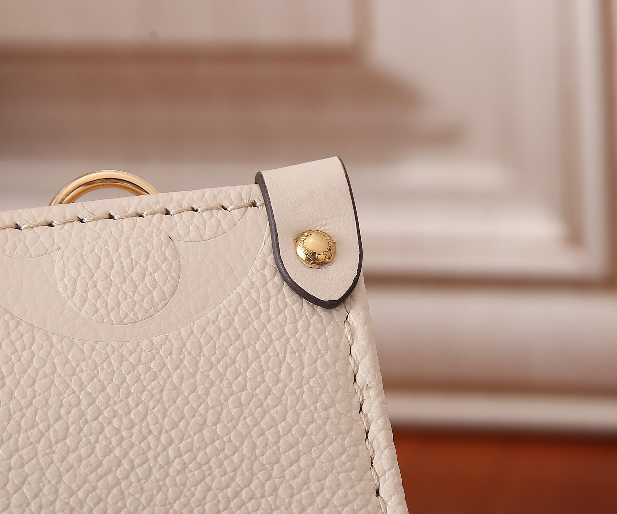 LV OnTheGo East West M23698 9.8 x 5.1 x 3.9 inches