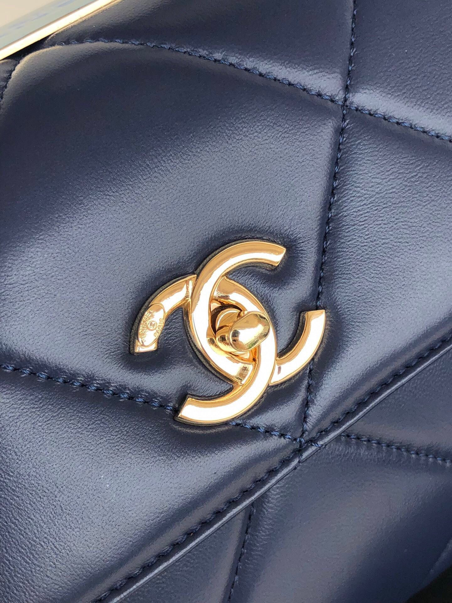 Ch*el flap bag with top handle 6.6 × 9.8 × 4.7 in